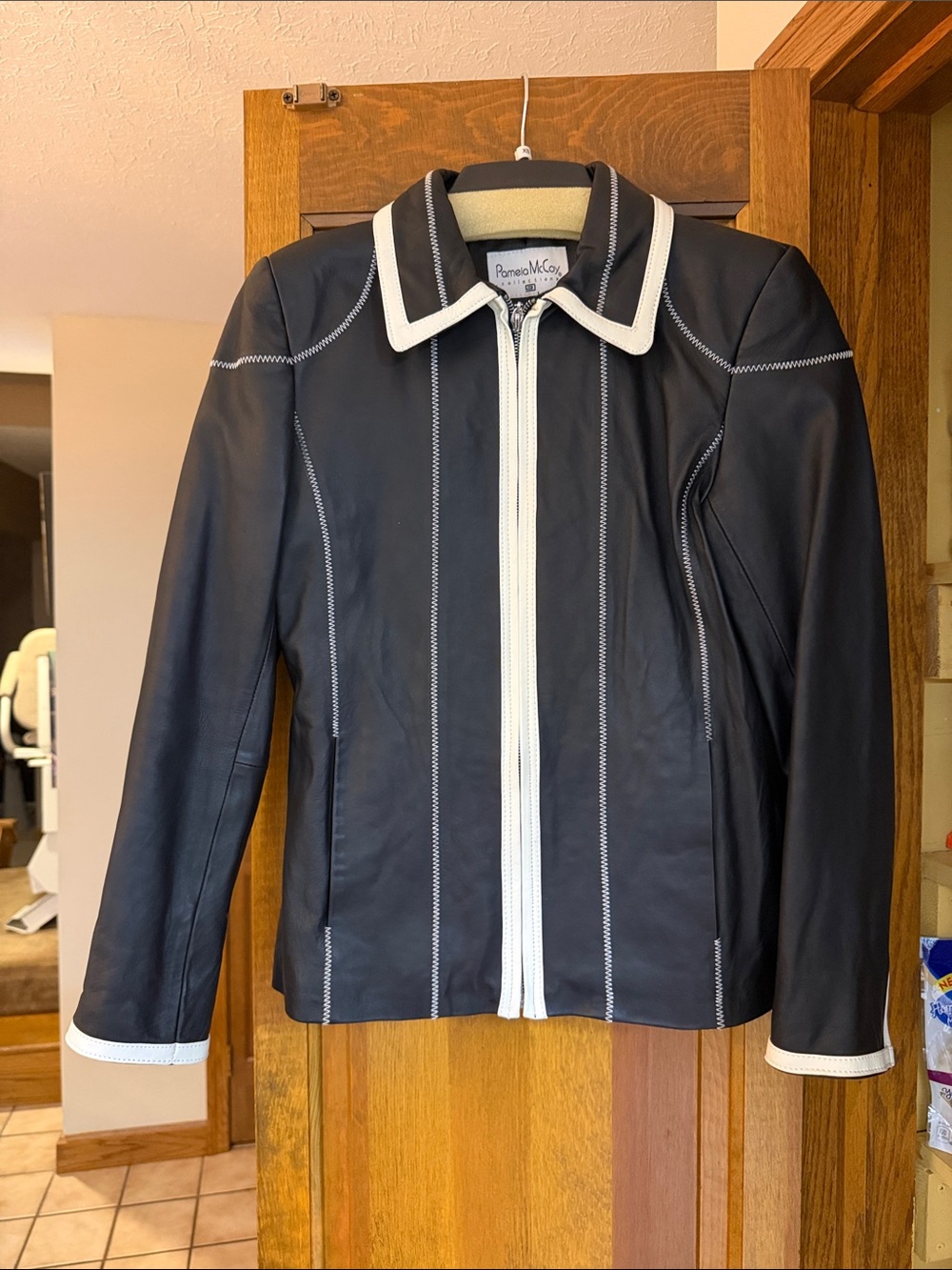 Pamela McCoy Black Leather Jacket with White Trim